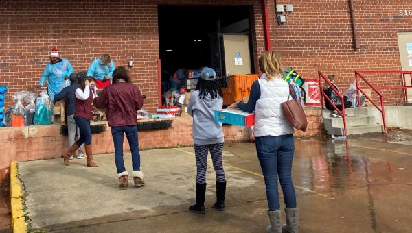 AFPM staff lining up to donate toys