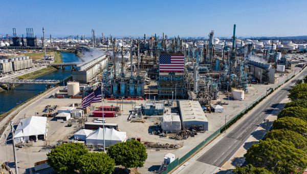 refinery with american flag