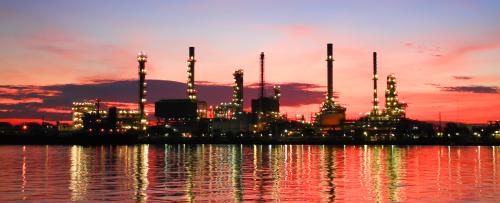refinery at sunset
