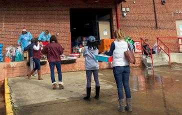 AFPM staff lining up to donate toys