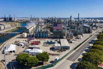 refinery with american flag