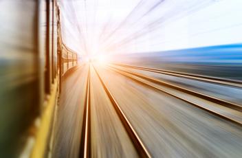 moving train capturing image of rail track and side of train 